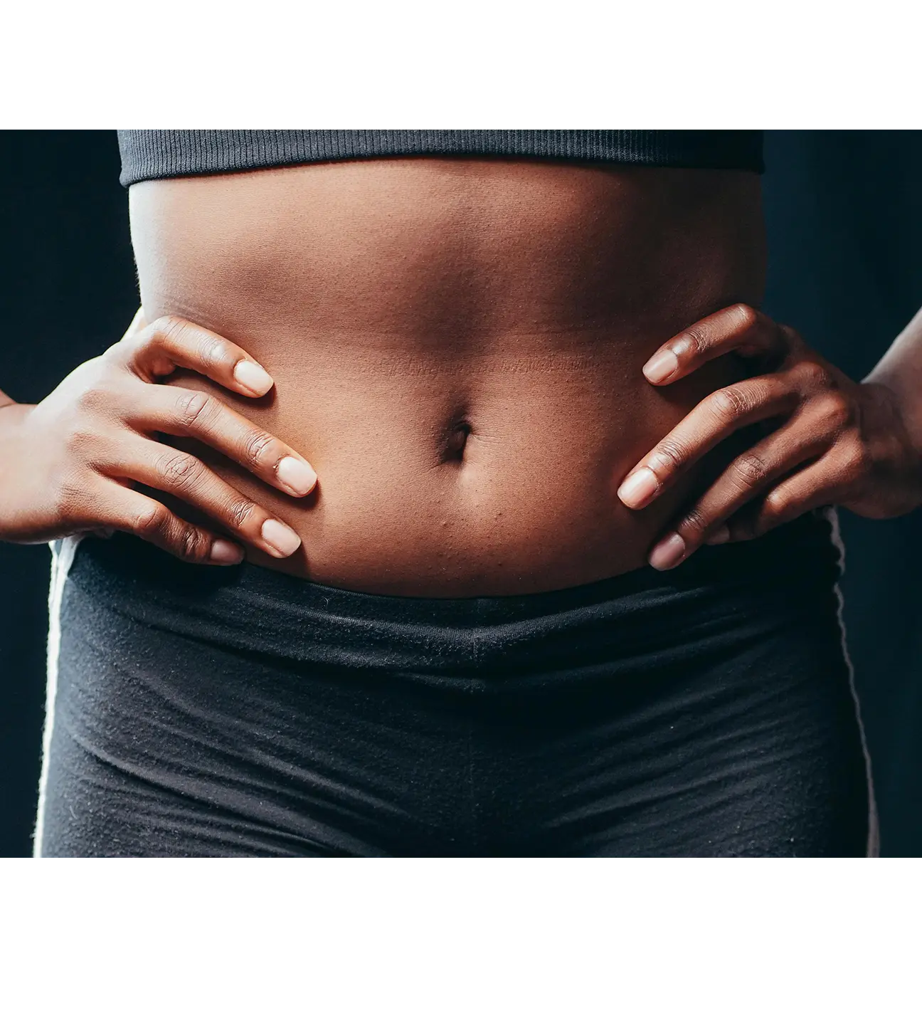 Black_Friday_Sale_Body_sculpting_Package_Love_Lotus_Life_2 Image of a woman showing her pelvic region with hands on her hips
